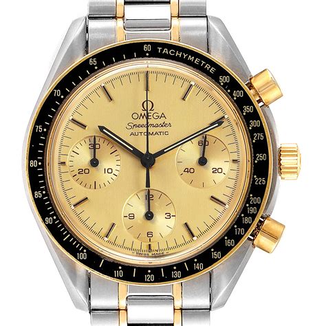 omega speedmaster gold steel.